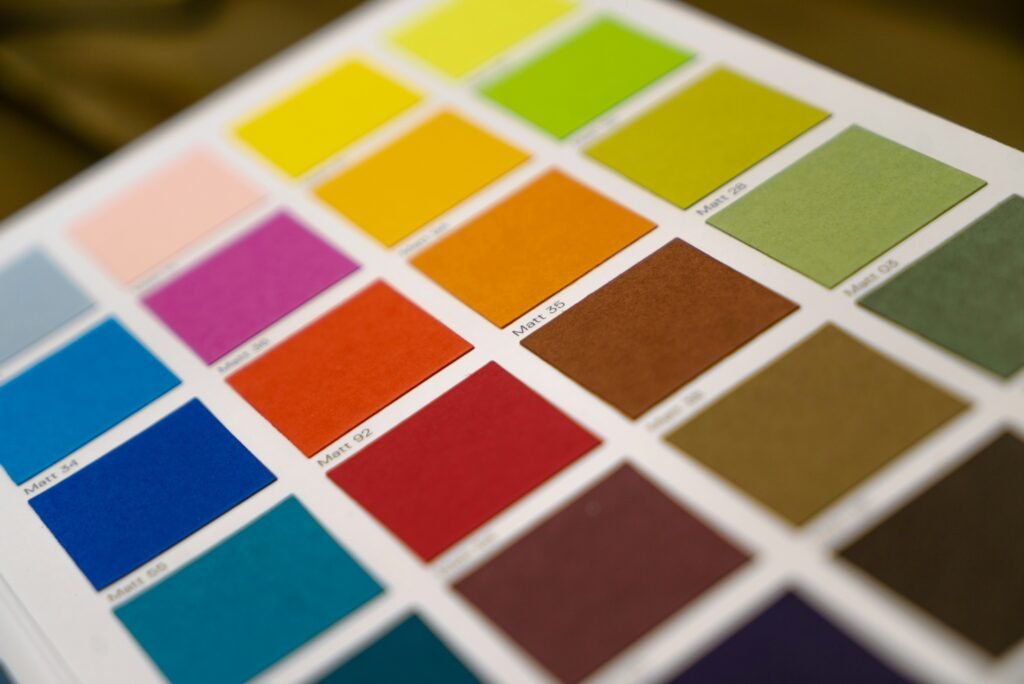 Color swatches in a design palette showing bright and muted tones for interior design psychology